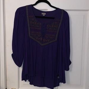 Purple long sleeved top